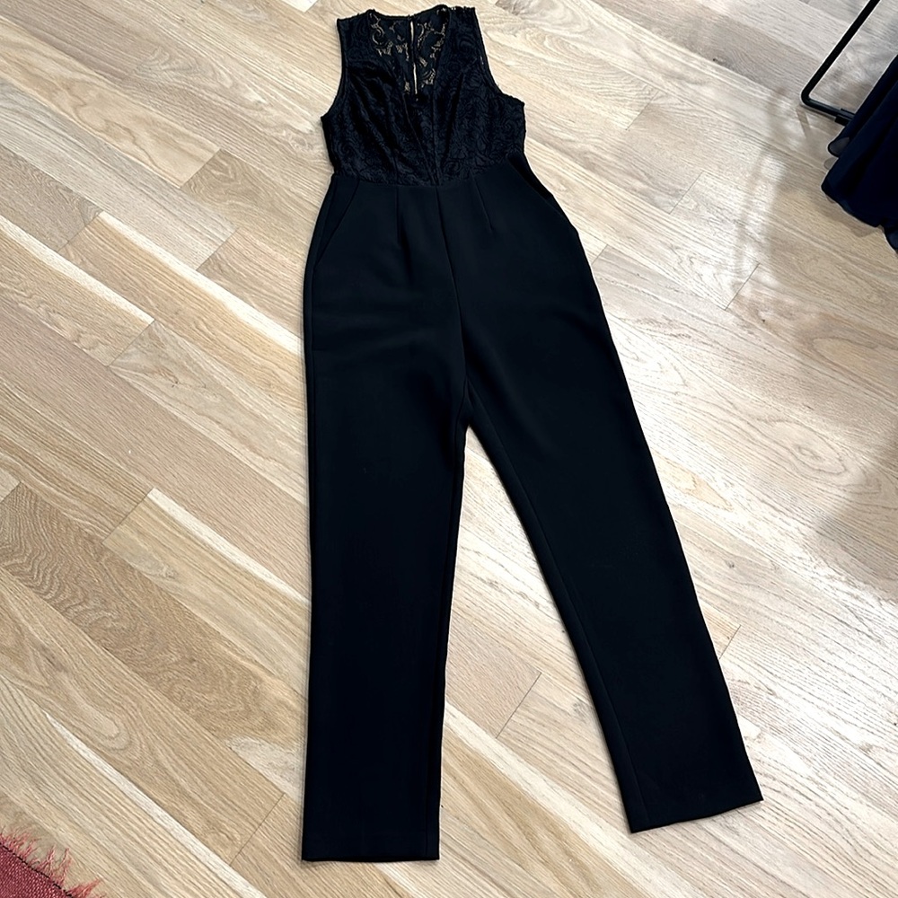 BCBGeneration Jumpsuit with lace detailing and pockets! Black, size 0